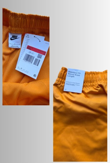 Nike sportswear woven flow short - kleur oranje - maat L