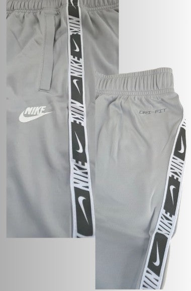 Nike Dri‑FIT Woven Tape Pants (Training / Lifestyle) - kleur grijs - maat XL